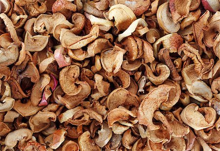 stacked apple slices - A lot of dried fruit. Dried slices apples background. Stock Photo - Budget Royalty-Free & Subscription, Code: 400-08315536