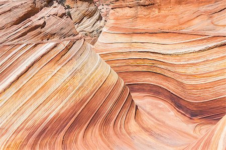 simsearch:400-08315671,k - The Wave is an awesome vivid swirling petrified dune sandstone formation in Coyote Buttes North. It could be seen in Paria Canyon-Vermilion Cliffs Wilderness, Arizona. USA Foto de stock - Super Valor sin royalties y Suscripción, Código: 400-08315667