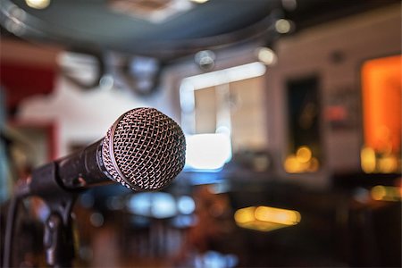 Closeup of audio microphone on stage background Stock Photo - Budget Royalty-Free & Subscription, Code: 400-08315722