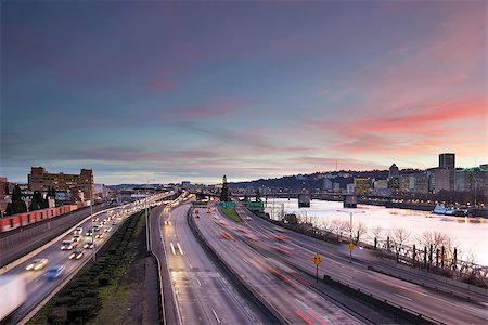Portland Oregon rush hour traffic with city skyline along Interstate freeway during sunset evening Stock Photo - Budget Royalty-Free & Subscription, Code: 400-08315991