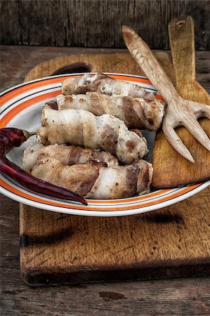 pork sausages on plate on wooden board rustic Stock Photo - Budget Royalty-Free & Subscription, Code: 400-08316535