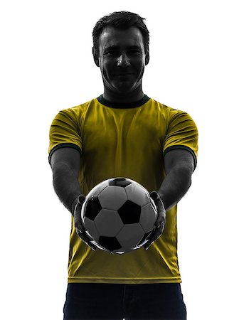 simsearch:400-07103133,k - one  man showing giving soccer football in silhouette on white background Stock Photo - Budget Royalty-Free & Subscription, Code: 400-08316819