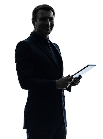 one  business man holding digital tablet posing portrait on white background Stock Photo - Budget Royalty-Free & Subscription, Code: 400-08316820