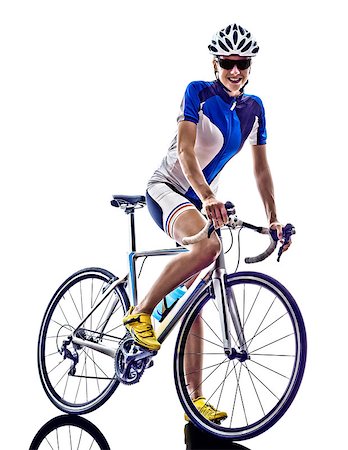 female triathlon - woman triathlon ironman athlete  cyclist cycling on white background Stock Photo - Budget Royalty-Free & Subscription, Code: 400-08317127