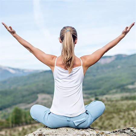 Blonde Woman Doing Yoga at the Mountains Stock Photo - Budget Royalty-Free & Subscription, Code: 400-08317284
