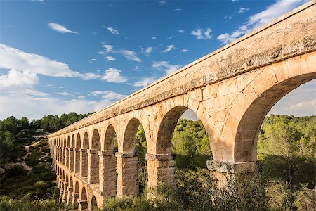 spain tarragona - Beautiful view of roman Aqueduct Pont del Diable in Tarragona Stock Photo - Budget Royalty-Free & Subscription, Code: 400-08317589