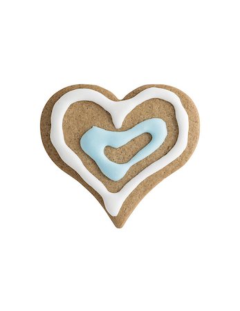 Gingerbread cookie heart isolated on white background - shot in studio Stock Photo - Budget Royalty-Free & Subscription, Code: 400-08317744