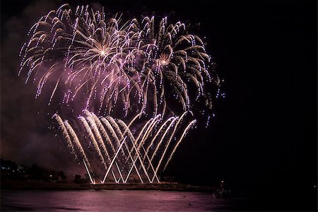 firecracker rocket - Fireworks over sea and Reflecting in Water Stock Photo - Budget Royalty-Free & Subscription, Code: 400-08317780