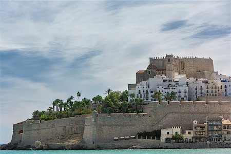The castle of Peniscola,  located on Costa del Azahar in Spain. This popular tourist destination is located on a rocky headland. Stock Photo - Budget Royalty-Free & Subscription, Code: 400-08317938