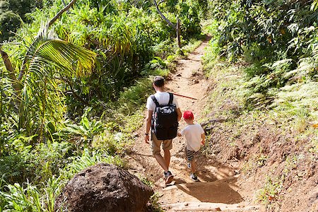 family of two hiking the kalalau trail at kauai island, hawaii Stock Photo - Budget Royalty-Free & Subscription, Code: 400-08318270