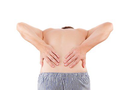simsearch:400-06476910,k - Back pain. Caucasian man touching lower back with both hands isolated on white background. Stock Photo - Budget Royalty-Free & Subscription, Code: 400-08318518