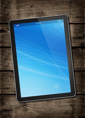 Digital tablet PC on a dark wood table - vertical office mockup Stock Photo - Budget Royalty-Free & Subscription, Code: 400-08318686