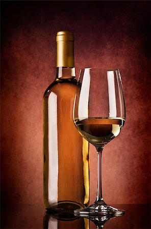 simsearch:400-05286682,k - Semi-dry white wine on a brown background Stock Photo - Budget Royalty-Free & Subscription, Code: 400-08334091