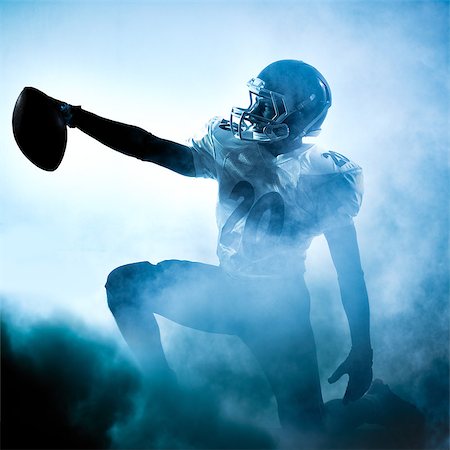 simsearch:400-08787080,k - one american football player portrait in silhouette shadow on white background Foto de stock - Super Valor sin royalties y Suscripción, Código: 400-08334142