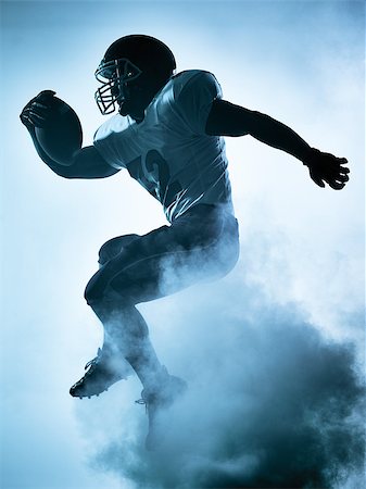 simsearch:400-08335037,k - one american football player portrait in silhouette shadow on white background Foto de stock - Royalty-Free Super Valor e Assinatura, Número: 400-08334362