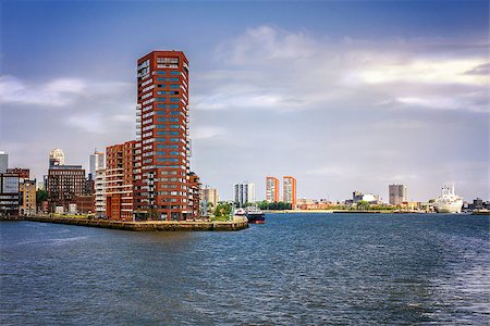 port rotterdam - In the port of Rotterdam, Netherlands, overlooking the Schiehaven and the Waalhaven and the Lloyd Pier with Lloyd Tower Stock Photo - Budget Royalty-Free & Subscription, Code: 400-08334539