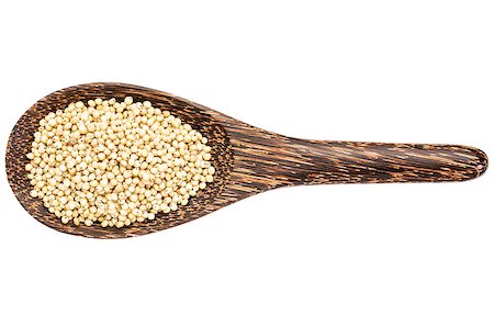 simsearch:400-08342097,k - gluten free white sorghum grain on a wooden spoon isolated on white Foto de stock - Super Valor sin royalties y Suscripción, Código: 400-08334683