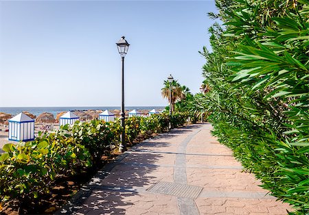 simsearch:400-08093570,k - Seafront promenade along El Duque beach. Tenerife, Canary Islands. Spain Fotografie stock - Microstock e Abbonamento, Codice: 400-08334880