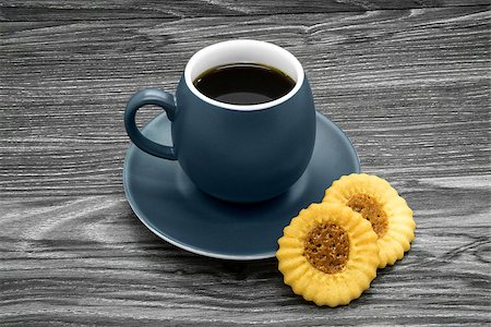 Grey ceramic cup of coffee on a wooden background. Stockbilder - Microstock & Abonnement, Bildnummer: 400-08334975