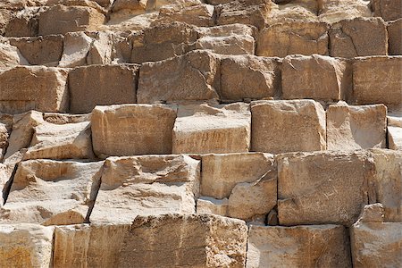 Brown stony wall of egyptian pyramid closeup Stock Photo - Budget Royalty-Free & Subscription, Code: 400-08334990