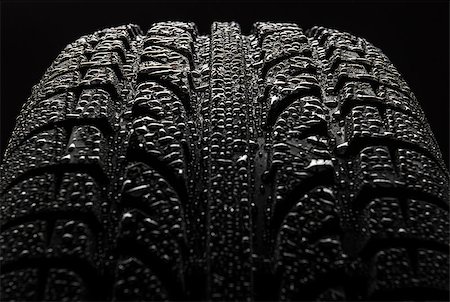 Tire with water drops over black background Stock Photo - Budget Royalty-Free & Subscription, Code: 400-08335124
