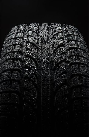 Tire with water drops over black background Stock Photo - Budget Royalty-Free & Subscription, Code: 400-08335129