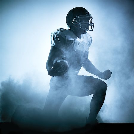 simsearch:400-08787080,k - one american football player portrait in silhouette shadow on white background Foto de stock - Super Valor sin royalties y Suscripción, Código: 400-08335238