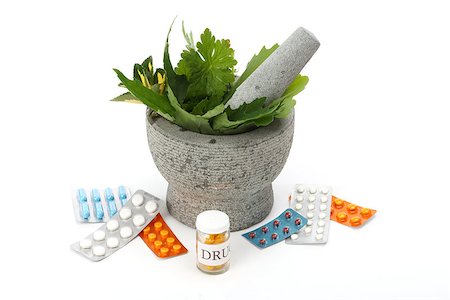 simsearch:400-08697202,k - Mortar, pestle, herbs and pills over white. Stock Photo - Budget Royalty-Free & Subscription, Code: 400-08335426