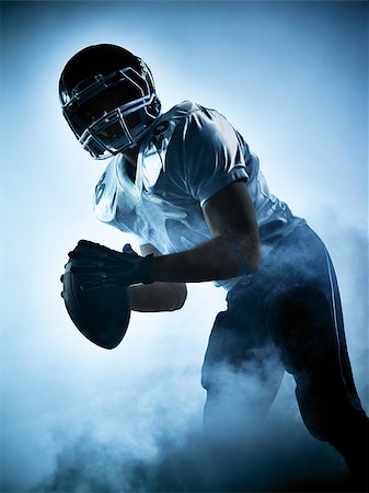 simsearch:400-08335037,k - one american football player portrait in silhouette shadow on white background Foto de stock - Royalty-Free Super Valor e Assinatura, Número: 400-08336190