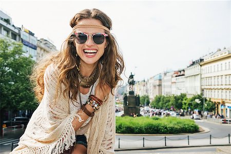 Portrait of young brunette woman tourist wearing boho clothes in  historical center of Prague. In the background Saint Wenceslas statue on Wenceslas Square in Prague. Tourism travel concept. Stock Photo - Budget Royalty-Free & Subscription, Code: 400-08336425
