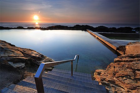 simsearch:400-07667033,k - The steps leading down into the Blue Pool, Bermagui, just after the sunrise, a nice place for a swim or to relax. Stock Photo - Budget Royalty-Free & Subscription, Code: 400-08337214