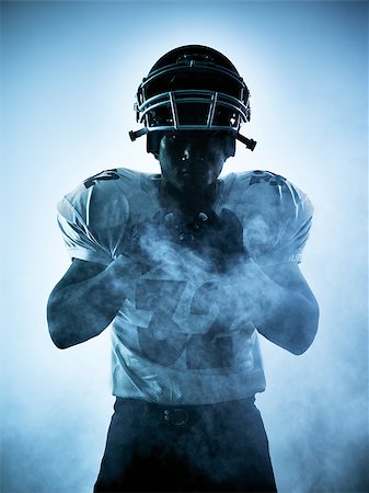 simsearch:400-08335037,k - one american football player portrait in silhouette shadow on white background Foto de stock - Royalty-Free Super Valor e Assinatura, Número: 400-08338229