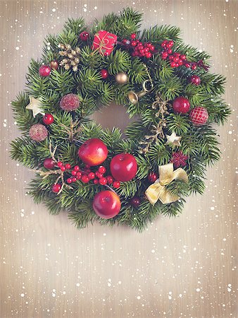 simsearch:400-07824858,k - Vintage Christmas wreath henging on old wooden background. Toned photo. Stock Photo - Budget Royalty-Free & Subscription, Code: 400-08338400