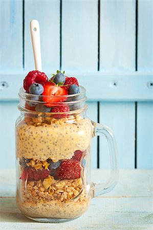 simsearch:400-07621143,k - Healthy breakfast. Chia seeds yogurt, homemade granola and fresh berries in glass mason jar. Stock Photo - Budget Royalty-Free & Subscription, Code: 400-08338459