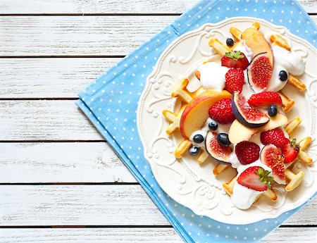 Fresh homemade waffles with whipped cream and fruit. Stock Photo - Budget Royalty-Free & Subscription, Code: 400-08338463