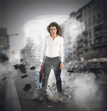 enterprise strength - Businesswoman at the center of a hurricane Stock Photo - Budget Royalty-Free & Subscription, Code: 400-08338513