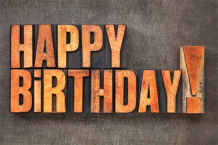 simsearch:400-08335158,k - Happy Birthday! -  text in vintage letterpress wood type blocks stained by red ink  on a grunge metal background Photographie de stock - Aubaine LD & Abonnement, Code: 400-08339205