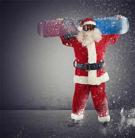 santa claus ski - Santa Claus with snowboard during a snowfall Foto de stock - Super Valor sin royalties y Suscripción, Código: 400-08339989