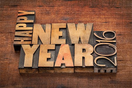 simsearch:400-08335158,k - Happy New Year 2016 greetings  - word abstract in vintage letterpress wood type blocks on a grunge wooden background Photographie de stock - Aubaine LD & Abonnement, Code: 400-08331852