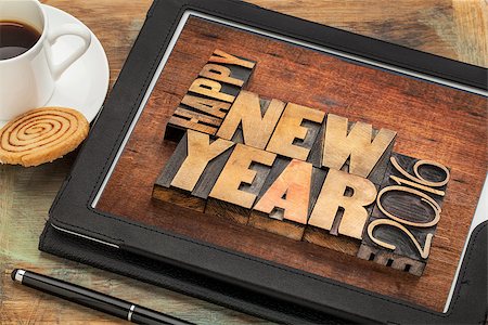 simsearch:400-08335158,k - Happy New Year 2016 greetings  - text in vintage letterpress wood type blocks on a digital tablet with a cup of coffee Photographie de stock - Aubaine LD & Abonnement, Code: 400-08331873