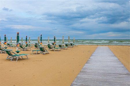 simsearch:400-06947087,k - Empty beach with chairs at Bibione in Italy. Stock Photo - Budget Royalty-Free & Subscription, Code: 400-08331977