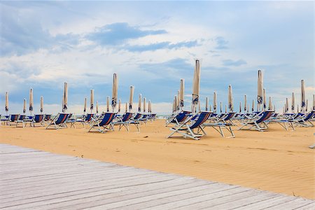simsearch:400-06947087,k - Empty beach with chairs at Bibione in Italy. Stock Photo - Budget Royalty-Free & Subscription, Code: 400-08331978