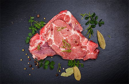 simsearch:400-07713408,k - Fresh raw meat on black board with spices and herbs Stock Photo - Budget Royalty-Free & Subscription, Code: 400-08332075