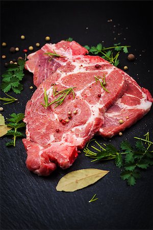 simsearch:400-07713408,k - Fresh raw meat on black board with spices and herbs Stock Photo - Budget Royalty-Free & Subscription, Code: 400-08332076