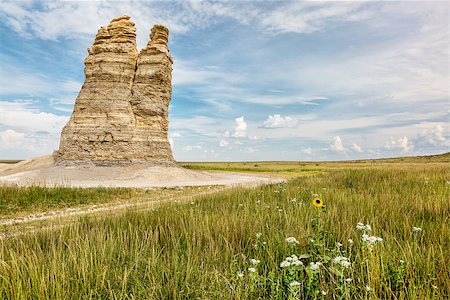 Castle Rock - limestone pillar landmark in prairie of western Kansas near Quinter (Gove County) with wildflowers, summer scenery Stock Photo - Budget Royalty-Free & Subscription, Code: 400-08332151