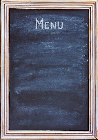 Old blackboard with white chalk and eraser for menu or price. Foto de stock - Super Valor sin royalties y Suscripción, Código: 400-08332814