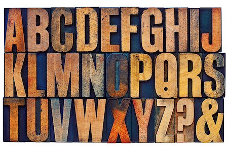 26 letters of English alphabet, question mark and ampersand - vintage letterpress wood type printing blocks stained by color inks Stock Photo - Budget Royalty-Free & Subscription, Code: 400-08332876