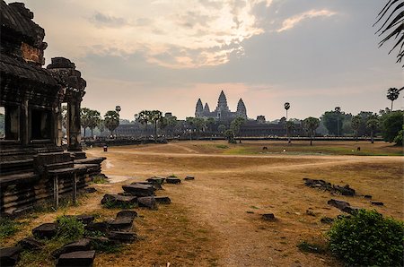 simsearch:400-08332388,k - Angkor Wat, part of Khmer temple complex, popular among tourists ancient lanmark and place of worship in Southeast Asia. Siem Reap, Cambodia. Photographie de stock - Aubaine LD & Abonnement, Code: 400-08332944