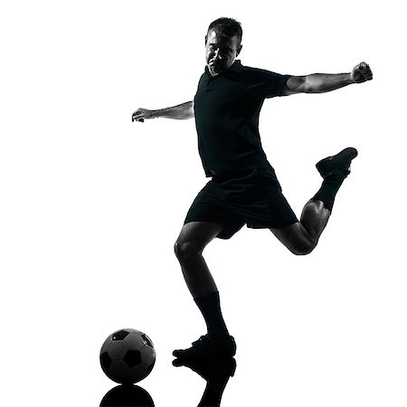 simsearch:400-07973357,k - one man soccer player in studio silhouette isolated on white background Stock Photo - Budget Royalty-Free & Subscription, Code: 400-08333451