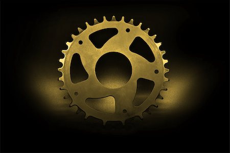 simsearch:400-09089843,k - Golden bicycle chainring on a black background. Stock Photo - Budget Royalty-Free & Subscription, Code: 400-08333834